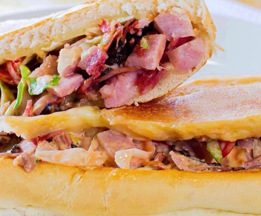 Pernil y Queso Sandwich - Traditional Puerto Rican roasted pork and cheese sandwich